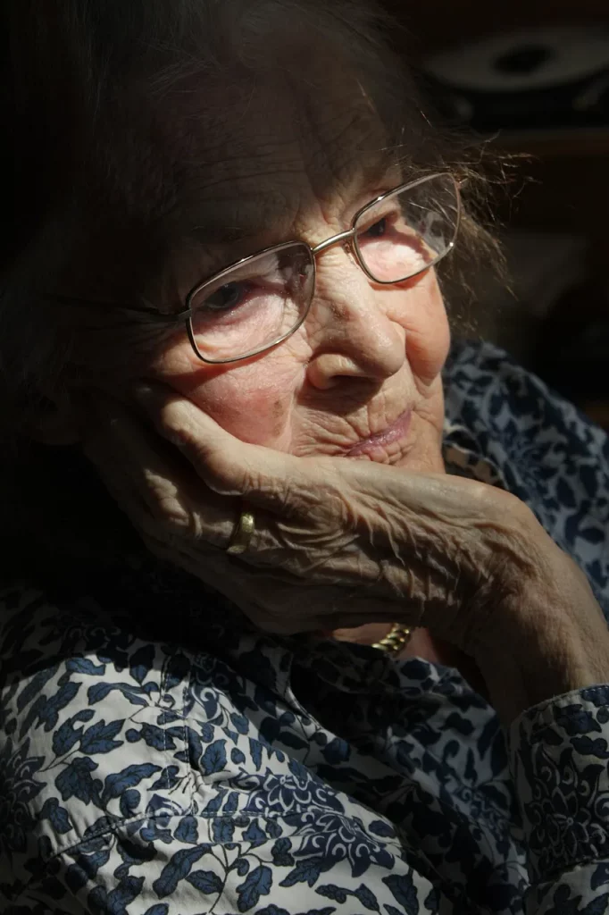 an elderly woman with glasses