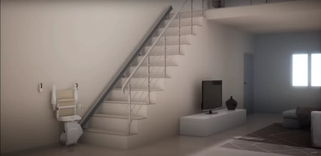 a stairlift folded at the bottom of the stairs